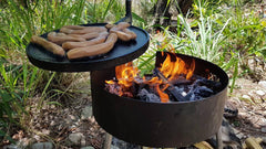 Camping Fire Pit and Swinging BBQ www.aussiecampfirekitchens.com